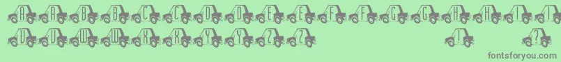 フォントCartown – 緑の背景に灰色の文字