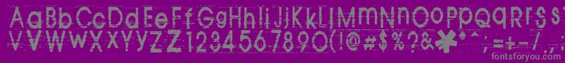 フォントTomva ffy – 紫の背景に灰色の文字