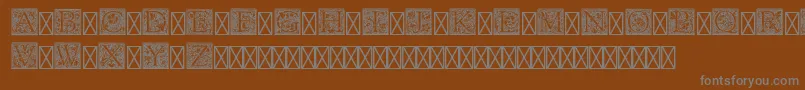 PfGoudyInitialsPro Font – Gray Fonts on Brown Background