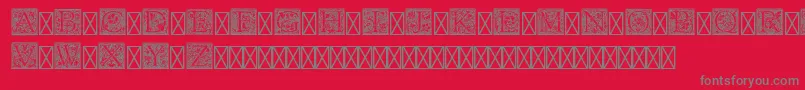 Fonte PfGoudyInitialsPro – fontes cinzas em um fundo vermelho