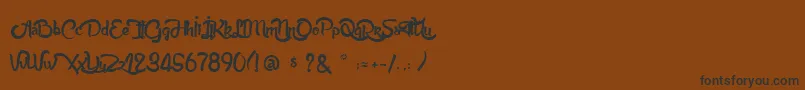 AnabelleScript Font – Black Fonts on Brown Background