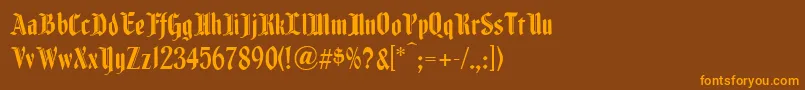 Fenwickwoodtype Font – Orange Fonts on Brown Background