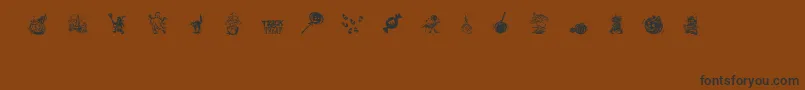 TrickOrTreatDing Font – Black Fonts on Brown Background