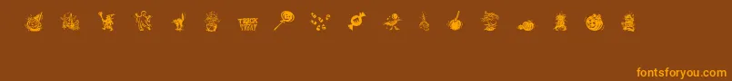 TrickOrTreatDing Font – Orange Fonts on Brown Background