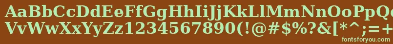 フォントAeMashqBold – 緑色の文字が茶色の背景にあります。