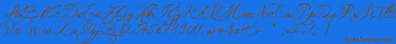 JellykaWesternPrincess-Schriftart – Braune Schriften auf blauem Hintergrund