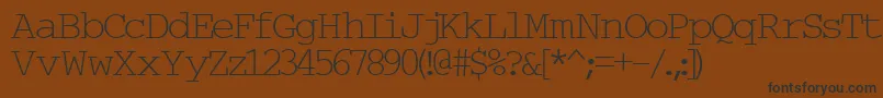 Шрифт TypewriterNormal – чёрные шрифты на коричневом фоне