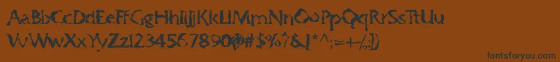 フォントGumbootcha – 黒い文字が茶色の背景にあります