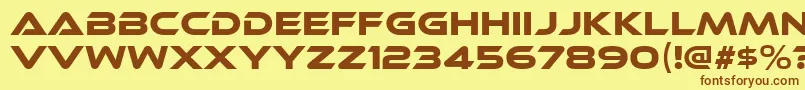 EthnocentricRg Font – Brown Fonts on Yellow Background