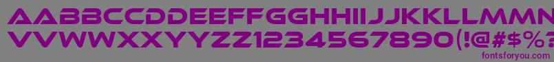 フォントEthnocentricRg – 紫色のフォント、灰色の背景