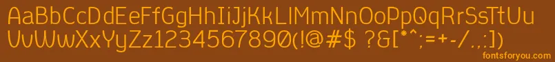 AleksandracRegular Font – Orange Fonts on Brown Background