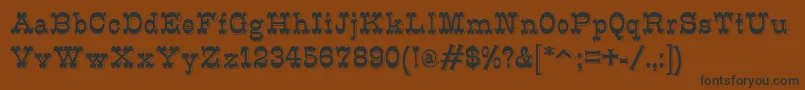 K22Eclair Font – Black Fonts on Brown Background