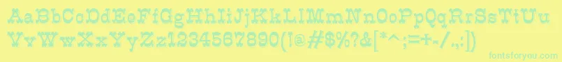 K22Eclair Font – Green Fonts on Yellow Background