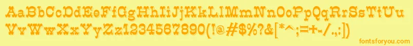 K22Eclair Font – Orange Fonts on Yellow Background