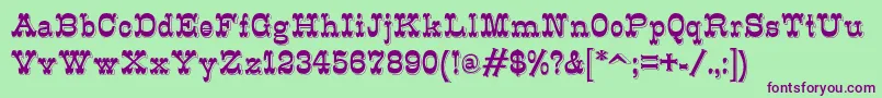 K22Eclair Font – Purple Fonts on Green Background