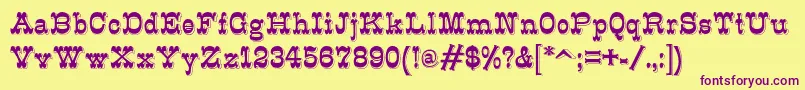 K22Eclair Font – Purple Fonts on Yellow Background