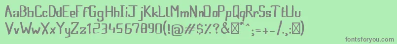 FroggyprincessRegular-fontti – harmaat kirjasimet vihreällä taustalla