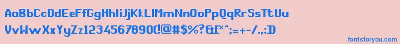 フォントComРІdie – ピンクの背景に青い文字