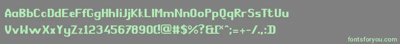 ComРІdie Font – Green Fonts on Gray Background