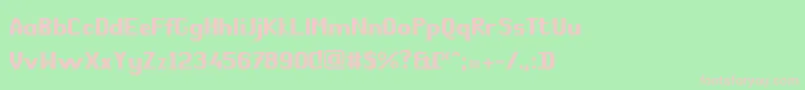 フォントComРІdie – 緑の背景にピンクのフォント