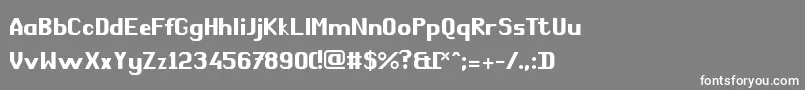 フォントComРІdie – 灰色の背景に白い文字