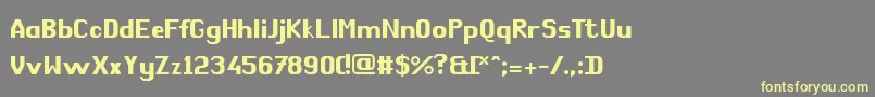 フォントComРІdie – 黄色のフォント、灰色の背景
