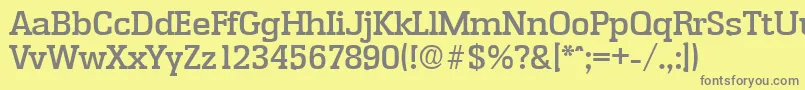 フォントEnschedeMedium – 黄色の背景に灰色の文字