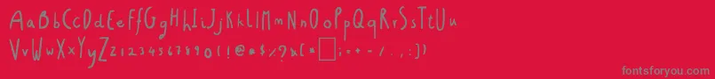 フォントChristmasGift – 赤い背景に灰色の文字