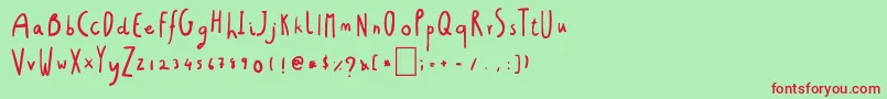 ChristmasGift Font – Red Fonts on Green Background