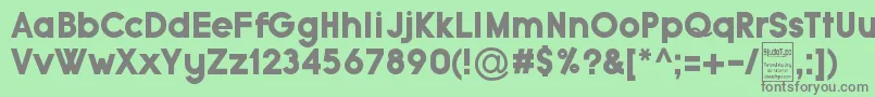 フォントTypoGroteskBlackDemo – 緑の背景に灰色の文字