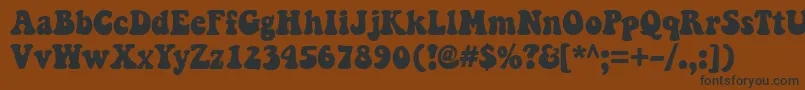 KeepOnTruckinfw Font – Black Fonts on Brown Background