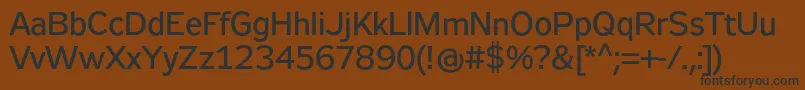 Zeppelin32 Font – Black Fonts on Brown Background