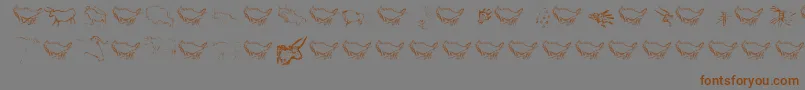 Caveart Font – Brown Fonts on Gray Background
