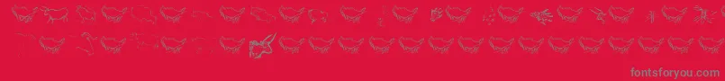 Caveart-Schriftart – Graue Schriften auf rotem Hintergrund