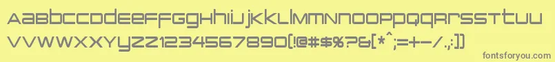 PcapTerminalCondensed-Schriftart – Graue Schriften auf gelbem Hintergrund