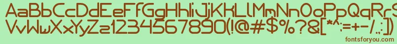 Internationalist Font – Brown Fonts on Green Background