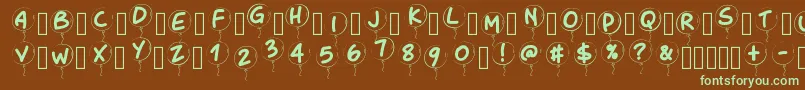 Pwballoon-fontti – vihreät fontit ruskealla taustalla