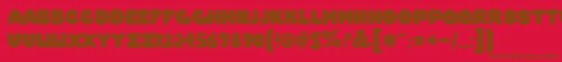 OvermuchRegular Font – Brown Fonts on Red Background