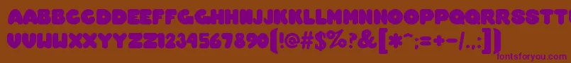 OvermuchRegular Font – Purple Fonts on Brown Background