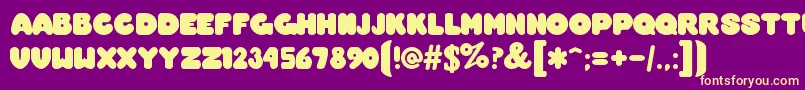 OvermuchRegular Font – Yellow Fonts on Purple Background