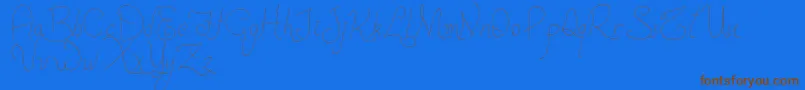 NewSpirit-Schriftart – Braune Schriften auf blauem Hintergrund