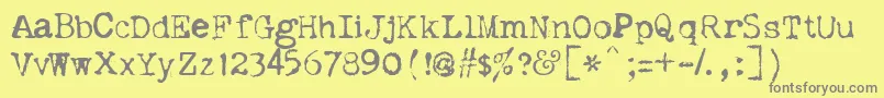 Dislexia-fontti – harmaat kirjasimet keltaisella taustalla