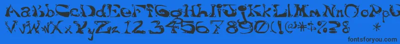 Aajaxsurrealfreak-fontti – mustat fontit sinisellä taustalla