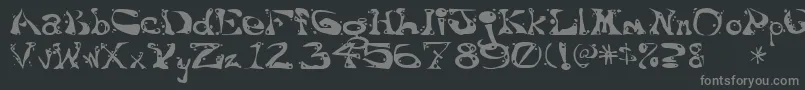 Aajaxsurrealfreak Font – Gray Fonts on Black Background