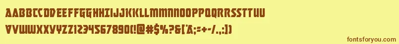 フォントMasterbreakercond – 茶色の文字が黄色の背景にあります。