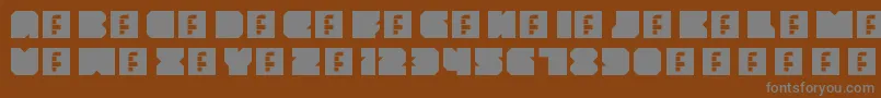フォントThrowbackRegular – 茶色の背景に灰色の文字