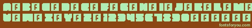 フォントThrowbackRegular – 緑色の文字が茶色の背景にあります。