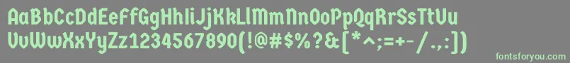 GermaniaoneRegular-fontti – vihreät fontit harmaalla taustalla