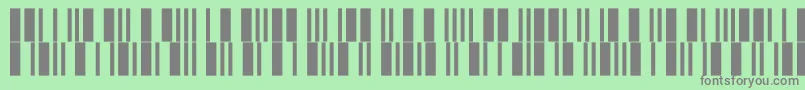 Fonte Intp12dltt – fontes cinzas em um fundo verde