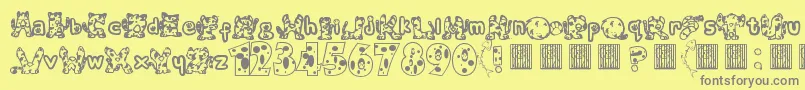 Meow-fontti – harmaat kirjasimet keltaisella taustalla